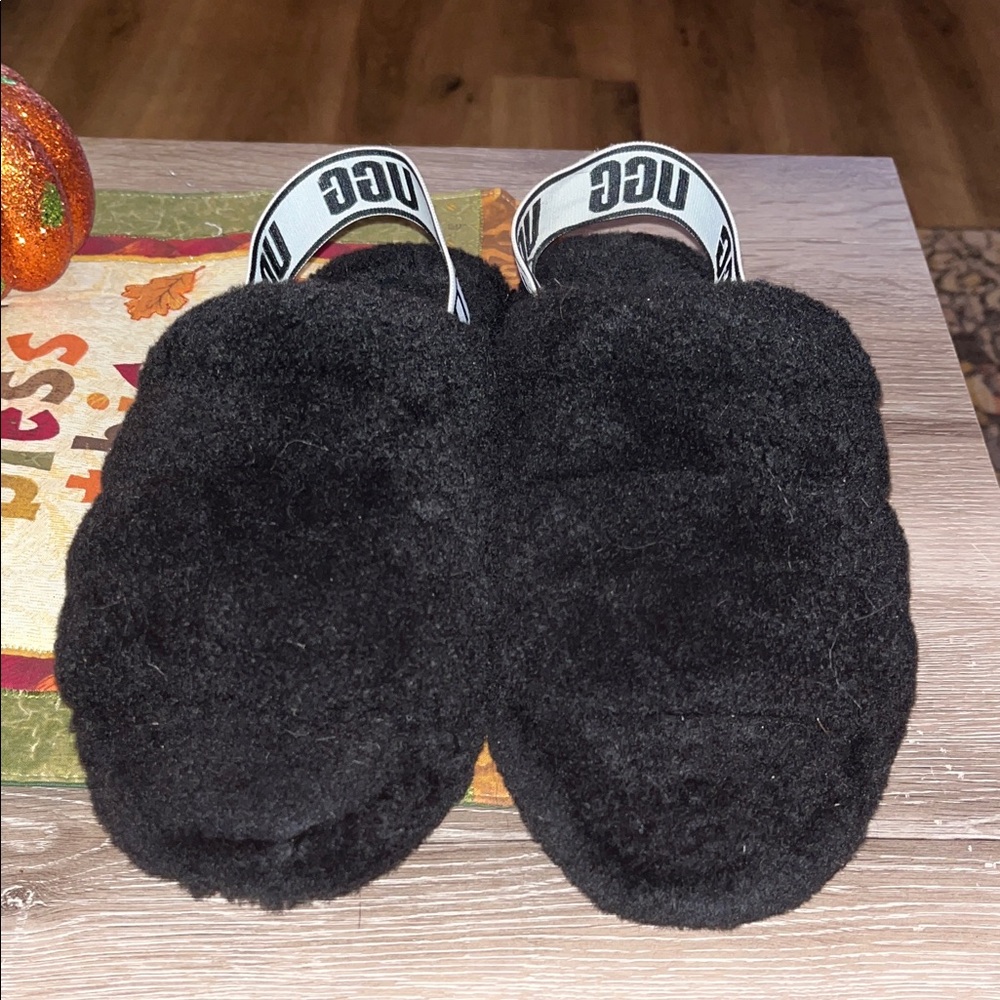 UGG Woman’s Black Fuzzy Slippers
